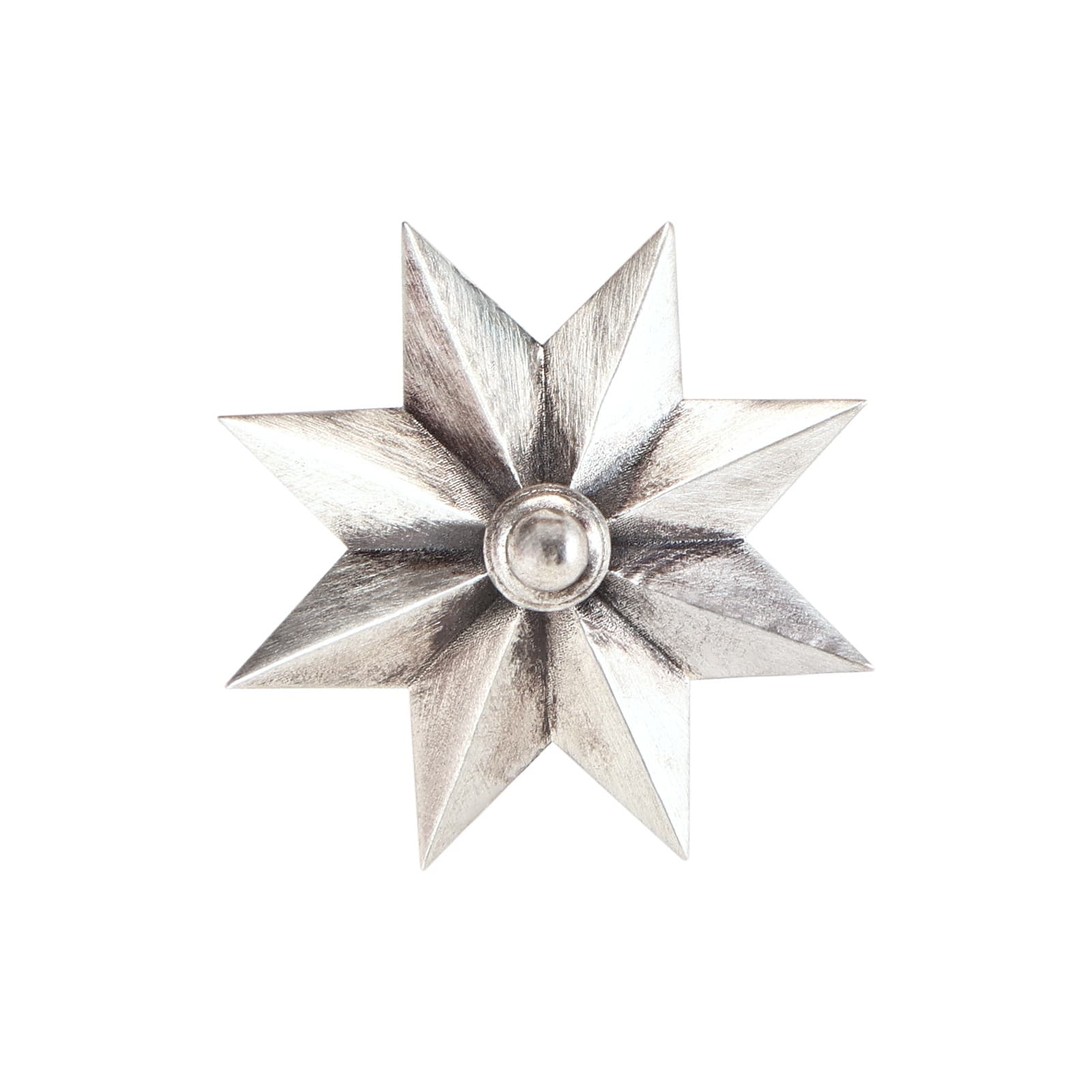 A single silver earring shaped like an eight-pointed star with a central round stud, shown on a white background