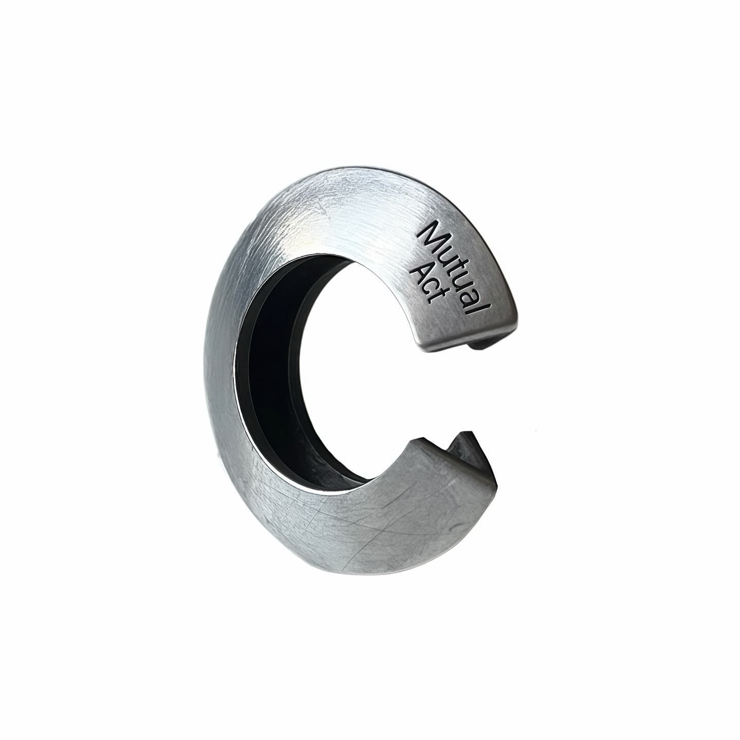 A brushed silver Ris cuff ring with Mutual Act engraved on the side, displayed against a white background